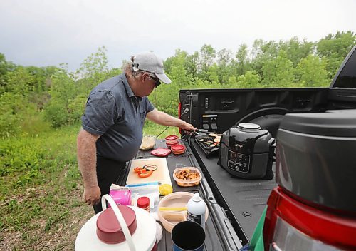 RUTH BONNEVILLE / WINNIPEG FREE PRESS


ENT - cooking with Ford F-150

Subject: F-150 PowerBoost Hybrid and lunch

Landing the F-150 on the food page by using the electric outlets located on the plate bed of  the Electric truck to prepare lunch outside.   

Details: Will be cooking lunch using the hybrid truck's 7.6-kW on-board power. Air-fryer coconut shrimp with mango chutney, grilled summer vegetable salad, air-fryer apple fritter for dessert, virgin strawberry margarita. Come hungry.

Photos of kitchen set up in the bed, the truck in its 'wild' surroundings, candids of Kelly cooking, as well as prepared food photos.  
Grilled veggies and coconut shrimp.  

 
For the food page: Wed., June 23

June 16,, 2021

