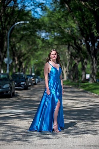 MIKAELA MACKENZIE / WINNIPEG FREE PRESS

Isabell Neves, who is graduating from Kelvin High School, poses for a portrait in her grad dress in Winnipeg on Wednesday, June 16, 2021. She set up the Instagram account @KelvinDresses2021 as a way to prevent people from showing up to grad in the same dress - now, it's a way for students to show off their finest since their grad dance isn't happening. For Jen Zoratti story.
Winnipeg Free Press 2021.