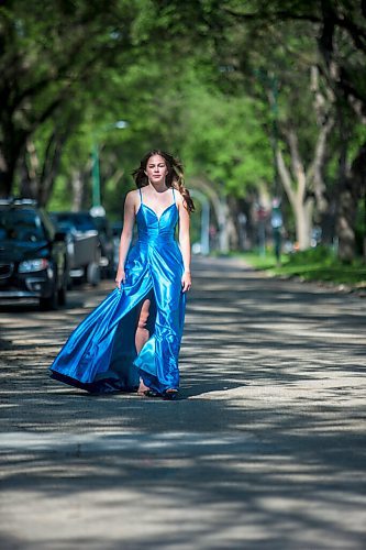 MIKAELA MACKENZIE / WINNIPEG FREE PRESS

Isabell Neves, who is graduating from Kelvin High School, poses for a portrait in her grad dress in Winnipeg on Wednesday, June 16, 2021. She set up the Instagram account @KelvinDresses2021 as a way to prevent people from showing up to grad in the same dress - now, it's a way for students to show off their finest since their grad dance isn't happening. For Jen Zoratti story.
Winnipeg Free Press 2021.