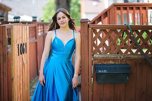 MIKAELA MACKENZIE / WINNIPEG FREE PRESS

Isabell Neves, who is graduating from Kelvin High School, poses for a portrait in her grad dress in Winnipeg on Wednesday, June 16, 2021. She set up the Instagram account @KelvinDresses2021 as a way to prevent people from showing up to grad in the same dress - now, it's a way for students to show off their finest since their grad dance isn't happening. For Jen Zoratti story.
Winnipeg Free Press 2021.