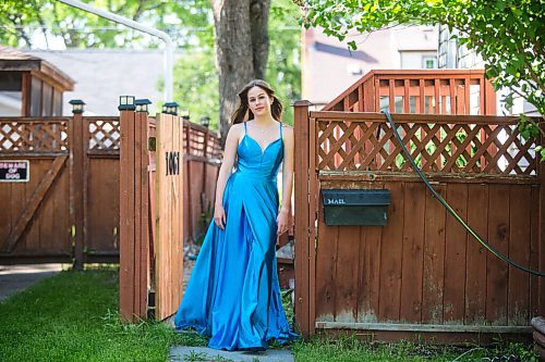 MIKAELA MACKENZIE / WINNIPEG FREE PRESS

Isabell Neves, who is graduating from Kelvin High School, poses for a portrait in her grad dress in Winnipeg on Wednesday, June 16, 2021. She set up the Instagram account @KelvinDresses2021 as a way to prevent people from showing up to grad in the same dress - now, it's a way for students to show off their finest since their grad dance isn't happening. For Jen Zoratti story.
Winnipeg Free Press 2021.