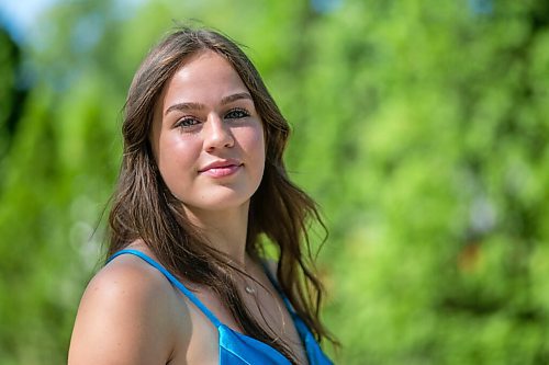 MIKAELA MACKENZIE / WINNIPEG FREE PRESS

Isabell Neves, who is graduating from Kelvin High School, poses for a portrait in her grad dress in Winnipeg on Wednesday, June 16, 2021. She set up the Instagram account @KelvinDresses2021 as a way to prevent people from showing up to grad in the same dress - now, it's a way for students to show off their finest since their grad dance isn't happening. For Jen Zoratti story.
Winnipeg Free Press 2021.