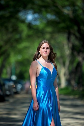 MIKAELA MACKENZIE / WINNIPEG FREE PRESS

Isabell Neves, who is graduating from Kelvin High School, poses for a portrait in her grad dress in Winnipeg on Wednesday, June 16, 2021. She set up the Instagram account @KelvinDresses2021 as a way to prevent people from showing up to grad in the same dress - now, it's a way for students to show off their finest since their grad dance isn't happening. For Jen Zoratti story.
Winnipeg Free Press 2021.