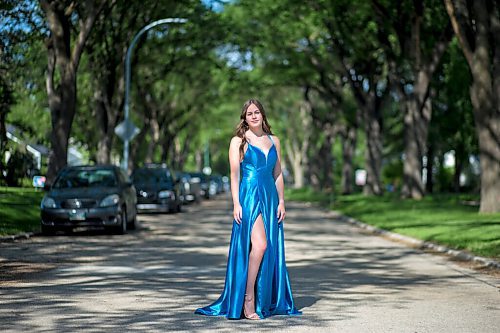 MIKAELA MACKENZIE / WINNIPEG FREE PRESS

Isabell Neves, who is graduating from Kelvin High School, poses for a portrait in her grad dress in Winnipeg on Wednesday, June 16, 2021. She set up the Instagram account @KelvinDresses2021 as a way to prevent people from showing up to grad in the same dress - now, it's a way for students to show off their finest since their grad dance isn't happening. For Jen Zoratti story.
Winnipeg Free Press 2021.