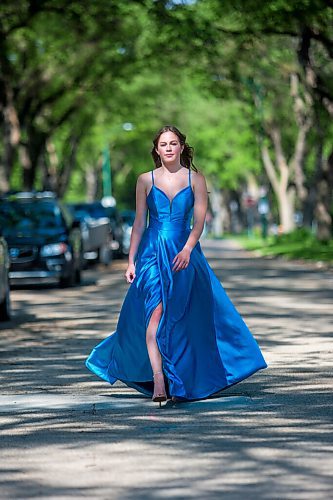 MIKAELA MACKENZIE / WINNIPEG FREE PRESS

Isabell Neves, who is graduating from Kelvin High School, poses for a portrait in her grad dress in Winnipeg on Wednesday, June 16, 2021. She set up the Instagram account @KelvinDresses2021 as a way to prevent people from showing up to grad in the same dress - now, it's a way for students to show off their finest since their grad dance isn't happening. For Jen Zoratti story.
Winnipeg Free Press 2021.