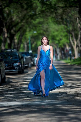 MIKAELA MACKENZIE / WINNIPEG FREE PRESS

Isabell Neves, who is graduating from Kelvin High School, poses for a portrait in her grad dress in Winnipeg on Wednesday, June 16, 2021. She set up the Instagram account @KelvinDresses2021 as a way to prevent people from showing up to grad in the same dress - now, it's a way for students to show off their finest since their grad dance isn't happening. For Jen Zoratti story.
Winnipeg Free Press 2021.