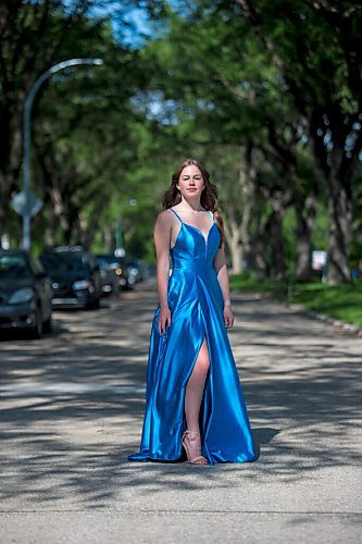 MIKAELA MACKENZIE / WINNIPEG FREE PRESS

Isabell Neves, who is graduating from Kelvin High School, poses for a portrait in her grad dress in Winnipeg on Wednesday, June 16, 2021. She set up the Instagram account @KelvinDresses2021 as a way to prevent people from showing up to grad in the same dress - now, it's a way for students to show off their finest since their grad dance isn't happening. For Jen Zoratti story.
Winnipeg Free Press 2021.