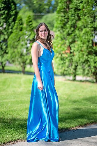 MIKAELA MACKENZIE / WINNIPEG FREE PRESS

Isabell Neves, who is graduating from Kelvin High School, poses for a portrait in her grad dress in Winnipeg on Wednesday, June 16, 2021. She set up the Instagram account @KelvinDresses2021 as a way to prevent people from showing up to grad in the same dress - now, it's a way for students to show off their finest since their grad dance isn't happening. For Jen Zoratti story.
Winnipeg Free Press 2021.