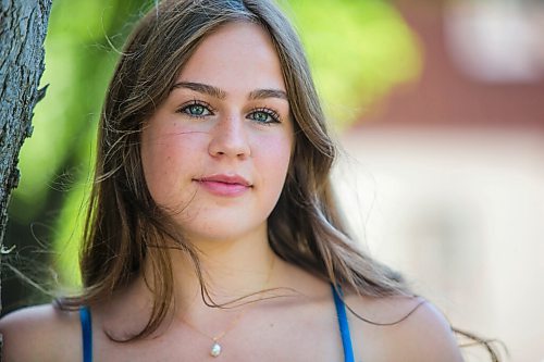 MIKAELA MACKENZIE / WINNIPEG FREE PRESS

Isabell Neves, who is graduating from Kelvin High School, poses for a portrait in her grad dress in Winnipeg on Wednesday, June 16, 2021. She set up the Instagram account @KelvinDresses2021 as a way to prevent people from showing up to grad in the same dress - now, it's a way for students to show off their finest since their grad dance isn't happening. For Jen Zoratti story.
Winnipeg Free Press 2021.