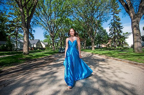 MIKAELA MACKENZIE / WINNIPEG FREE PRESS

Isabell Neves, who is graduating from Kelvin High School, poses for a portrait in her grad dress in Winnipeg on Wednesday, June 16, 2021. She set up the Instagram account @KelvinDresses2021 as a way to prevent people from showing up to grad in the same dress - now, it's a way for students to show off their finest since their grad dance isn't happening. For Jen Zoratti story.
Winnipeg Free Press 2021.