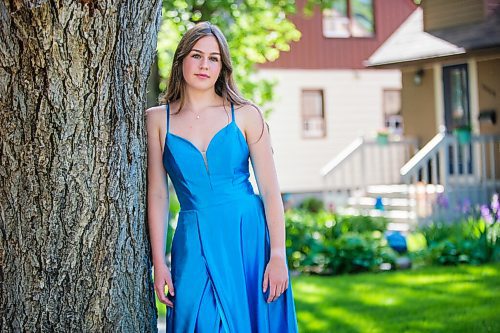 MIKAELA MACKENZIE / WINNIPEG FREE PRESS

Isabell Neves, who is graduating from Kelvin High School, poses for a portrait in her grad dress in Winnipeg on Wednesday, June 16, 2021. She set up the Instagram account @KelvinDresses2021 as a way to prevent people from showing up to grad in the same dress - now, it's a way for students to show off their finest since their grad dance isn't happening. For Jen Zoratti story.
Winnipeg Free Press 2021.