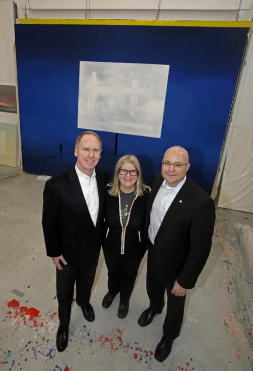 BORIS.MINKEVICH@FREEPRESS.MB.CA  100318 BORIS MINKEVICH / WINNIPEG FREE PRESS Wanda Koop in between BMO Financial Group President and CEO Bill Downe (left) and BMO Vice-President Manitoba & NWO District Richard S. Jaques, with art that is going to an art gallery.