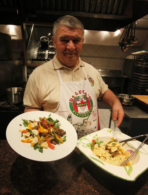 BORIS.MINKEVICH@FREEPRESS.MB.CA  100322 BORIS MINKEVICH / WINNIPEG FREE PRESS Tony de Luca  with a dish called Aglioae olioae vegetali.   Garlic oil and vegitables.