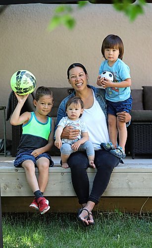 RUTH BONNEVILLE / WINNIPEG FREE PRESS

Column photo, Sabrina Carnevale - Pandemic Baby

Mom of 3, Amanda Ahing with her third child, Myleigh, (13 months - baby girl), she had last May 2020, along with her two sons, Nathaniel who is 7 (left) and Ashton who is 20 months, playing outside their home on Thursday. 

Description: My next column is about the challenges of having a baby during the pandemic - A recent Canadian study shows that mental health visits for individuals during postpartum were up 30% when compared to pre-pandemic.

Amanda Ahing is on maternity leave and the photo was taken while her husband Jason was working.  

Photo for Sabrina's column

June 17,, 2021

