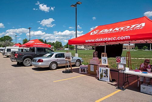 ALEX LUPUL / WINNIPEG FREE PRESS  

The Inaugural Farmer's and Artisans' Market is photographed outside of the Dakota Fieldhouse in Winnipeg on Thursday, June 17, 2021. More than a dozen vendors were on site selling items ranging from food to homegrown crafts.