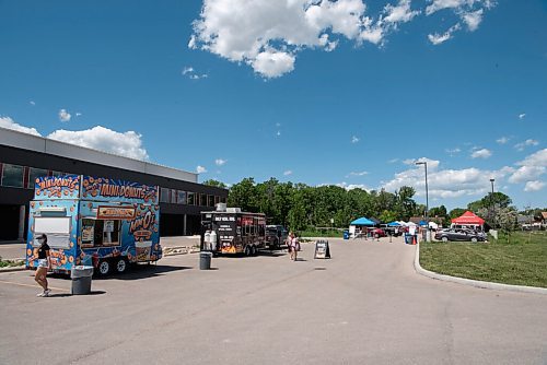 ALEX LUPUL / WINNIPEG FREE PRESS  

The Inaugural Farmer's and Artisans' Market is photographed outside of the Dakota Fieldhouse in Winnipeg on Thursday, June 17, 2021. More than a dozen vendors were on site selling items ranging from food to homegrown crafts.