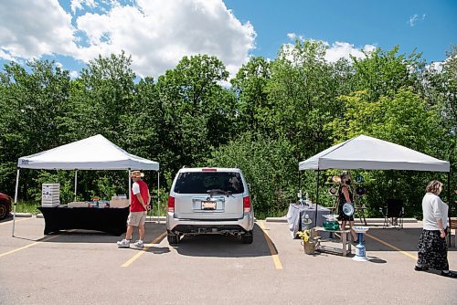 ALEX LUPUL / WINNIPEG FREE PRESS  

The Inaugural Farmer's and Artisans' Market is photographed outside of the Dakota Fieldhouse in Winnipeg on Thursday, June 17, 2021. More than a dozen vendors were on site selling items ranging from food to homegrown crafts.