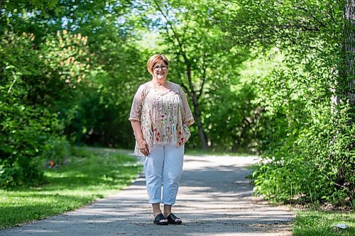 MIKAELA MACKENZIE / WINNIPEG FREE PRESS

Christine Schollenberg, outgoing executive director of the Childrens Rehabilitation Foundation, poses for a portrait in Munson Park in Winnipeg on Thursday, June 17, 2021. For --- story.
Winnipeg Free Press 2021.