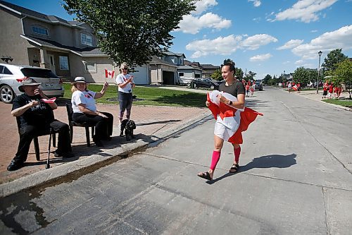 JOHN WOODS / WINNIPEG FREE PRESS
Winnipeg swimmer Kelsey Wog is greeted by her neighbours Thursday, June 17, 2021. Residents of Wogs street gathered at the end of their driveways to wish her well as she heads off to the national swimming trials. 

Reporter: Sawatzki