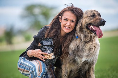 MIKAELA MACKENZIE / WINNIPEG FREE PRESS

Sierra Lathlin, owner of Barkery Dog Treats, poses for a portrait at Westview Park with her dog, Rocky, in Winnipeg on Friday, June 18, 2021. For Dave Sanderson story.
Winnipeg Free Press 2021.