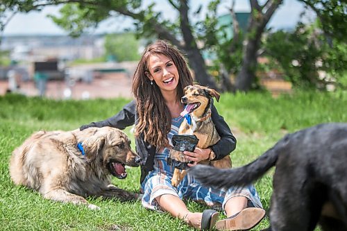 MIKAELA MACKENZIE / WINNIPEG FREE PRESS

Sierra Lathlin, owner of Barkery Dog Treats, poses for a portrait at Westview Park with her dogs, Rocky (left), Hilti, and Anna in Winnipeg on Friday, June 18, 2021. For Dave Sanderson story.
Winnipeg Free Press 2021.