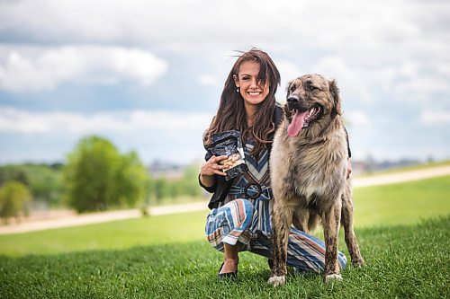 MIKAELA MACKENZIE / WINNIPEG FREE PRESS

Sierra Lathlin, owner of Barkery Dog Treats, poses for a portrait at Westview Park with her dog, Rocky, in Winnipeg on Friday, June 18, 2021. For Dave Sanderson story.
Winnipeg Free Press 2021.