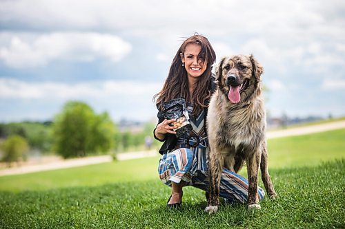 MIKAELA MACKENZIE / WINNIPEG FREE PRESS

Sierra Lathlin, owner of Barkery Dog Treats, poses for a portrait at Westview Park with her dog, Rocky, in Winnipeg on Friday, June 18, 2021. For Dave Sanderson story.
Winnipeg Free Press 2021.