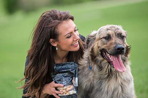 MIKAELA MACKENZIE / WINNIPEG FREE PRESS

Sierra Lathlin, owner of Barkery Dog Treats, poses for a portrait at Westview Park with her dog, Rocky, in Winnipeg on Friday, June 18, 2021. For Dave Sanderson story.
Winnipeg Free Press 2021.