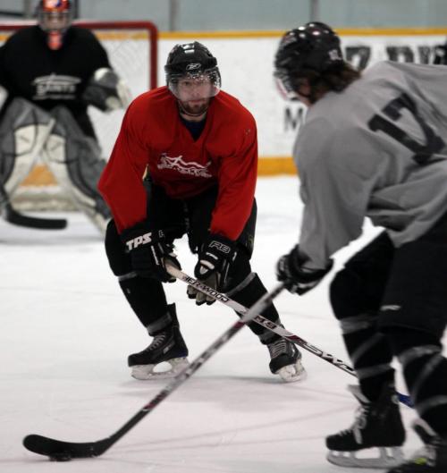 BORIS.MINKEVICH@FREEPRESS.MB.CA  100323 BORIS MINKEVICH / WINNIPEG FREE PRESS Winnipeg Saints forward Cole Pruden (in red) in practice.