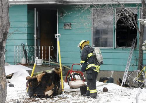 MIKE.DEAL@FREEPRESS.MB.CA 100324 - Wednesday, March 24th, 2010 A lone occupant of the house at 520 Hazel Dell Ave. was taken to hospital with unknown injuries from a fire according to Garry Pinette a Fire Chief (not in photo) at the scene. MIKE DEAL / WINNIPEG FREE PRESS