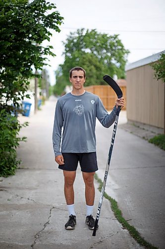 MIKE DEAL / WINNIPEG FREE PRESS
NHL draft prospect Carson Lambos works out in his home gym, the so-called Gritty Garage Monday morning.
See Mike Sawatzky story 
210621 - Monday, June 21, 2021.