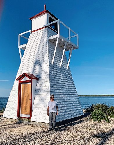 Canstar Community News Correspondent Joanne O'Leary pictured at the lighthouse on Hecla Island.