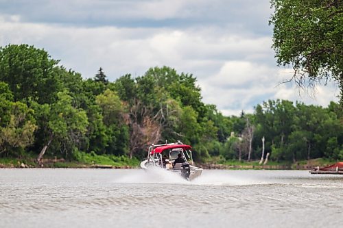 MIKAELA MACKENZIE / WINNIPEG FREE PRESS

Drag the Red launches their 2021 search for missing and murdered with a new boat (donated by Unifor) on the Red River near the Redwood Bridge in Winnipeg on Monday, June 21, 2021. Standup.
Winnipeg Free Press 2021.