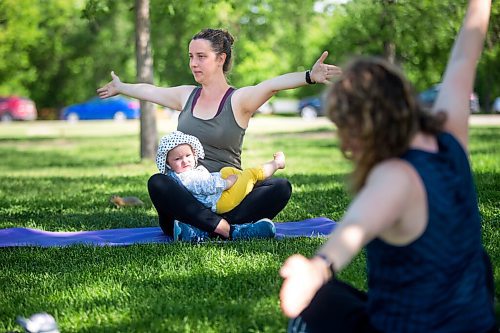 MIKAELA MACKENZIE / WINNIPEG FREE PRESS

Christine Kennedy and her baby, Rose Kennedy-Sharpe (one year old) do a Fit Together Pre & Postnatal Fitness pilates class at Assiniboine Park in Winnipeg on Wednesday, June 23, 2021. Standup.
Winnipeg Free Press 2021.