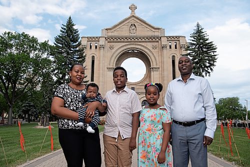 ALEX LUPUL / WINNIPEG FREE PRESS  

From left, Gloriose Nsabimana, Ange-Karel Ndeba Ishimwe, Ange-Axel Ndeba Iradukunda, Ange Kristy Ndeba Irakoze and Claude Marcel Ndeba pose for a portrait at the Saint-Boniface Cathedral in Winnipeg on Wednesday, June 23, 2021. For the family, being able to worship in French at the Cathedral is very important to them.