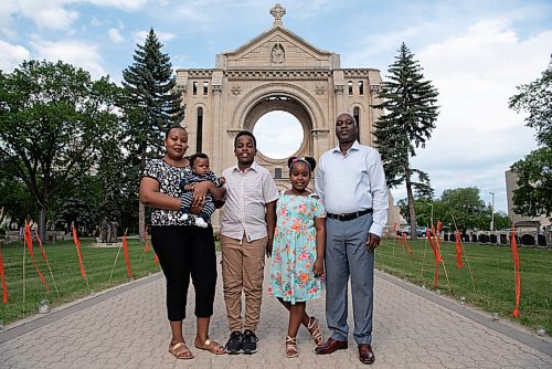 ALEX LUPUL / WINNIPEG FREE PRESS  

From left, Gloriose Nsabimana, Ange-Karel Ndeba Ishimwe, Ange-Axel Ndeba Iradukunda, Ange Kristy Ndeba Irakoze and Claude Marcel Ndeba pose for a portrait at the Saint-Boniface Cathedral in Winnipeg on Wednesday, June 23, 2021. For the family, being able to worship in French at the Cathedral is very important to them. 

Reporter: John Longhurst