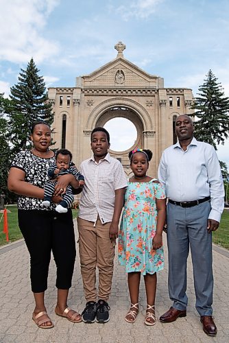 ALEX LUPUL / WINNIPEG FREE PRESS  

From left, Gloriose Nsabimana, Ange-Karel Ndeba Ishimwe, Ange-Axel Ndeba Iradukunda, Ange Kristy Ndeba Irakoze and Claude Marcel Ndeba pose for a portrait at the Saint-Boniface Cathedral in Winnipeg on Wednesday, June 23, 2021. For the family, being able to worship in French at the Cathedral is very important to them. 

Reporter: John Longhurst