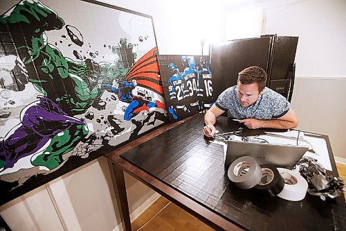 JOHN WOODS / WINNIPEG FREE PRESS
Levi Sobering, duct tape artist and founder of Duct Tape Dynasty, a home-based biz that produces duct tape art, works on a new piece in his home in Winnipeg Wednesday, June 23, 2021.

Reporter: Sanderson