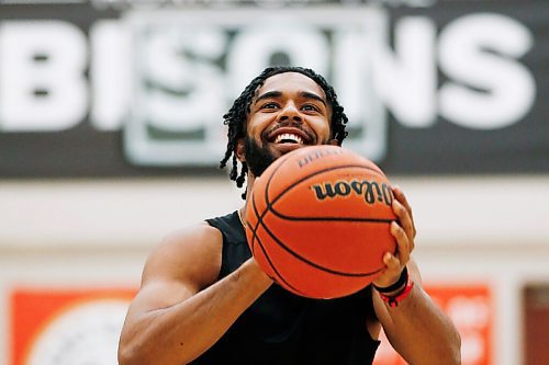 JOHN WOODS / WINNIPEG FREE PRESS
Keiran Zziwa, a U of MB Bison basketball player, throws some baskets at the university in Winnipeg Wednesday, June 23, 2021. Zziwa is heading to Morocco to play for Uganda at the Afro Basketball qualifier.

Reporter: Sawatzky