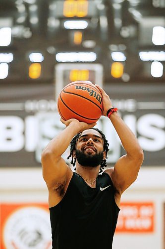 JOHN WOODS / WINNIPEG FREE PRESS
Keiran Zziwa, a U of MB Bison basketball player, throws some baskets at the university in Winnipeg Wednesday, June 23, 2021. Zziwa is heading to Morocco to play for Uganda at the Afro Basketball qualifier.

Reporter: Sawatzky