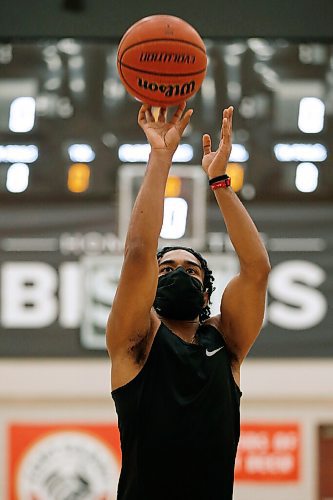 JOHN WOODS / WINNIPEG FREE PRESS
Keiran Zziwa, a U of MB Bison basketball player, throws some baskets at the university in Winnipeg Wednesday, June 23, 2021. Zziwa is heading to Morocco to play for Uganda at the Afro Basketball qualifier.

Reporter: Sawatzky