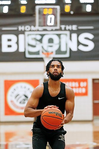 JOHN WOODS / WINNIPEG FREE PRESS
Keiran Zziwa, a U of MB Bison basketball player, throws some baskets at the university in Winnipeg Wednesday, June 23, 2021. Zziwa is heading to Morocco to play for Uganda at the Afro Basketball qualifier.

Reporter: Sawatzky