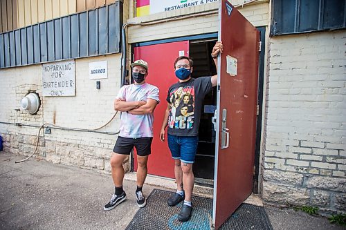 MIKAELA MACKENZIE / WINNIPEG FREE PRESS

Cousins Stefan Lytwyn (left) and Nyk Bielak, who started Kosmos Space Cowboy Cantina as a ghost kitchen restaurant last October, pose for a portrait in the German Society of Winnipeg basement kitchen in Winnipeg on Thursday, June 24, 2021. For Eva Wasney story.
Winnipeg Free Press 2021.