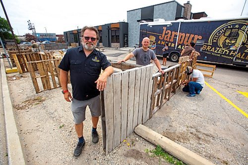 MIKE DEAL / WINNIPEG FREE PRESS
(from left) Kristjan Kristjansson and Kris Kopansky managing partners in Brazen Hall (800 Pembina Hwy) are building a large patio which should hold about 100 people given current capacity ratio of 50 per cent.
Brazen Hall is one of many local restaurants struggling to hire enough staff to open under new public health restrictions. They're delaying in-house dining until next week and have purchased digital ordering software to fill the gaps in table service while they're understaffed (guests order on their phone and food is delivered by a human when it's ready).
See Eva Wasney Story
210625 - Friday, June 25, 2021.