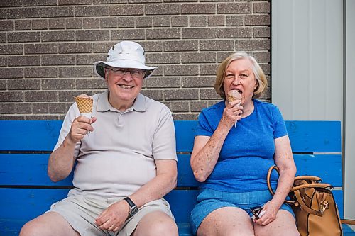 MIKAELA MACKENZIE / WINNIPEG FREE PRESS

Gerry and Joy Derek enjoy chocolate ice cream cones in Gimli on Friday, June 25, 2021. For Ben Waldman story.
Winnipeg Free Press 2021.