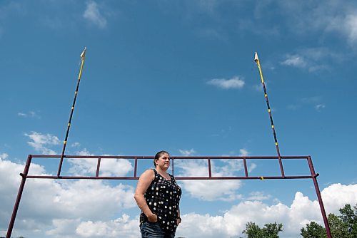 ALEX LUPUL / WINNIPEG FREE PRESS  

Jill Fast, Head Coach of the Portage Collegiate Institute Trojans Football team, poses for a portrait in Portage la Prairie on Friday, June 25, 2021. Fast is the first female head coach at the high school varsity level for the WHSFL football league.