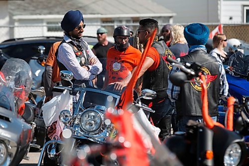 JOHN WOODS / WINNIPEG FREE PRESS
About 60-70 motorcycle riders get ready to hit the road to the residential school in Brandon from a business on Pembina Highway in Winnipeg Sunday, June 27, 2021. The group said the ride is a memorial for the children found in unmarked graves at  residential schools and to stand in solidarity with the Indigenous community.

Reporter: Standup
