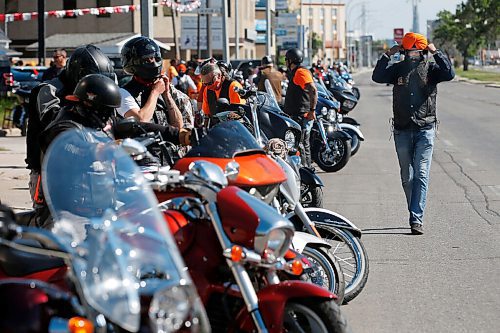 JOHN WOODS / WINNIPEG FREE PRESS
About 60-70 motorcycle riders get ready to hit the road to the residential school in Brandon from a business on Pembina Highway in Winnipeg Sunday, June 27, 2021. The group said the ride is a memorial for the children found in unmarked graves at  residential schools and to stand in solidarity with the Indigenous community.

Reporter: Standup