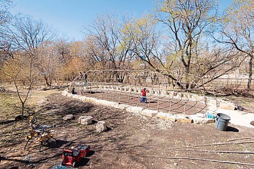 Canstar Community News MIKE SUDOMA / WINNIPEG FREE PRESS  
The traditional midewiwin lodge, currently under construction along the river banks south of the Forks Market, Friday afternoon
May 7, 2021