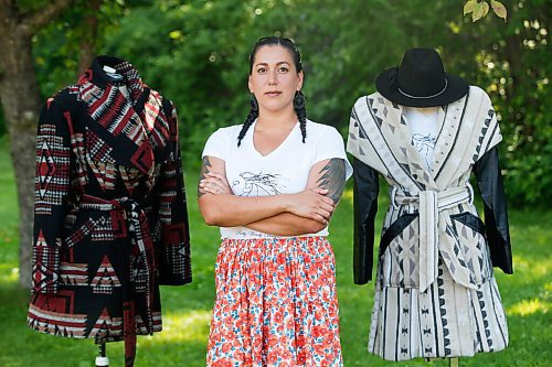 JOHN WOODS / WINNIPEG FREE PRESS
Wendy Sinclair, designer and owner of Pretty Windy Designs, is photographed with her creations at her home in Beaconia Tuesday, June 29, 2021. She designs all sorts of things from ponchos, blankets skirts, vests and jackets. Her designs are influenced by her Ojibway heritage on Brokenhead.

Reporter: Small